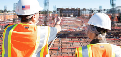 Workers looking over construction project